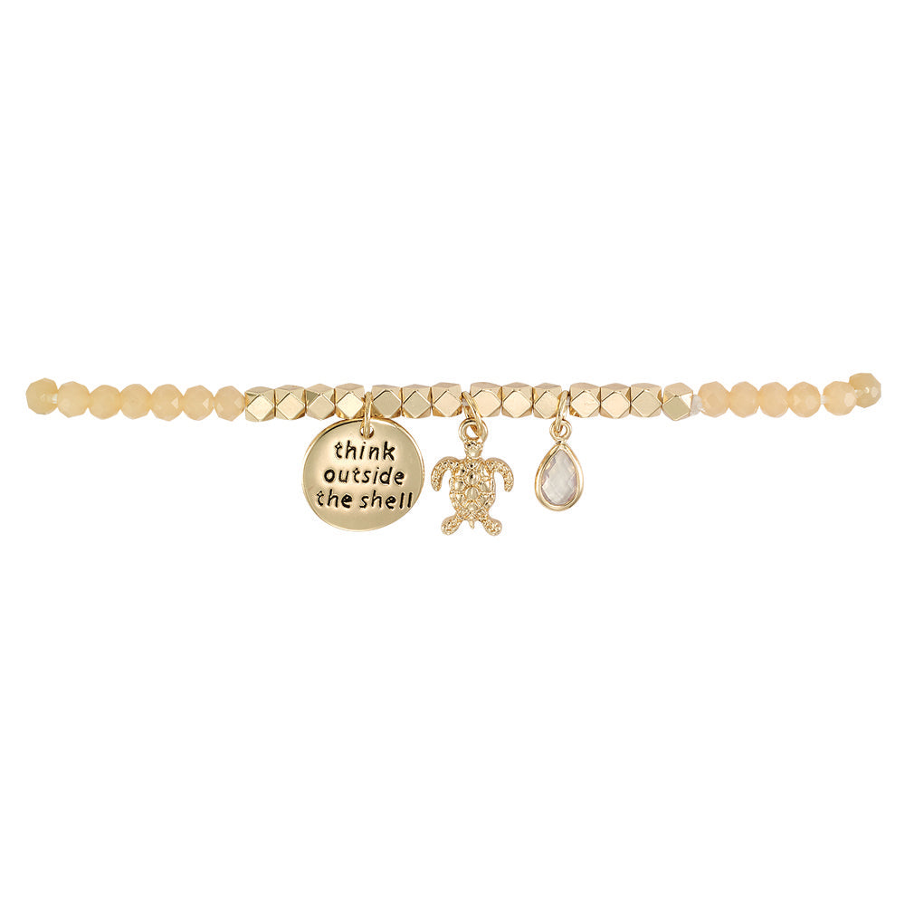 Think Outside the Shell Turtle Bracelet in Peach & Gold