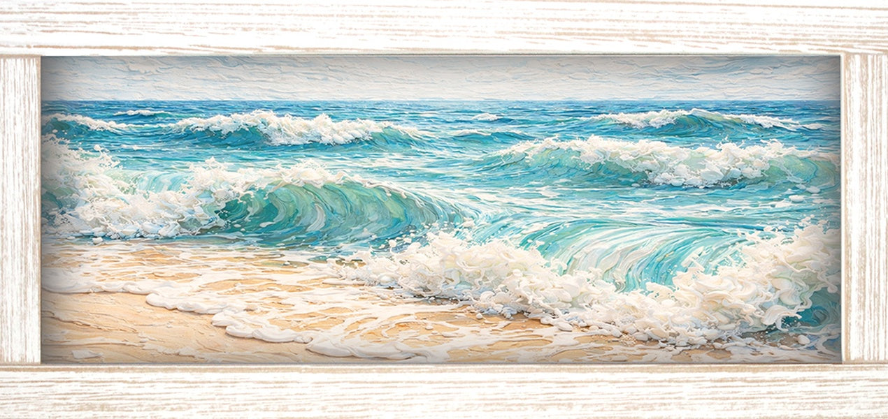 Print of turquoise waves crashing onto a golden sandy beach under a blue sky, shown in a light wood-tone frame.