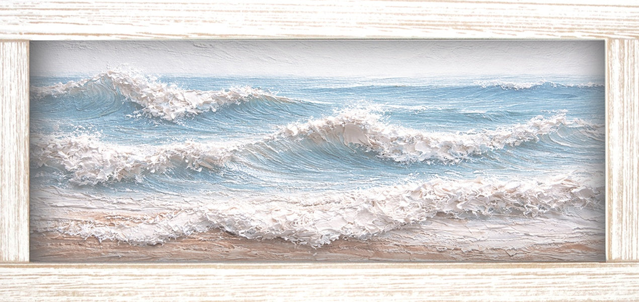 Print of rows of white waves rolling across a pale blue sea, shown in a light wood-tone frame.