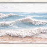 Print of rows of white waves rolling across a pale blue sea, shown in a white frame.